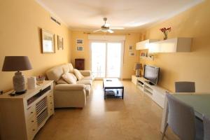A television and/or entertainment centre at Anacasa Atlas Estrella de Mar AP2215