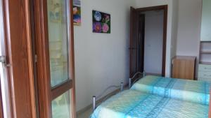Postel nebo postele na pokoji v ubytování B&B La Posada Stintino