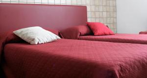 Postel nebo postele na pokoji v ubytování B&B S'ARROSA ANTIGA