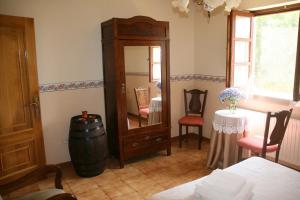 Łóżko lub łóżka w pokoju w obiekcie Casa Pousadoira