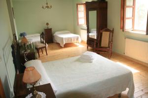 Giường trong phòng chung tại Casa Pousadoira