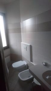 Koupelna v ubytování Hotel Lory + 14 fotografií