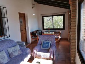 Posezení v ubytování Casita la Herilla