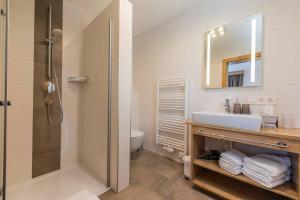 Kúpeľňa v ubytovaní Berg' & Bluamen Appartements Stubai