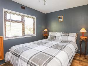 Postel nebo postele na pokoji v ubytování Castell Chalet