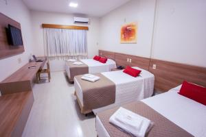 Postel nebo postele na pokoji v ubytování Carlton Plaza Hotel Uberlandia