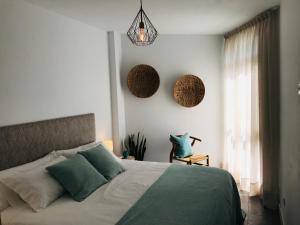 Postel nebo postele na pokoji v ubytování La Casa Verde + 37 fotografií