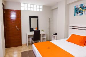 Postel nebo postele na pokoji v ubytování Mercé Hotel