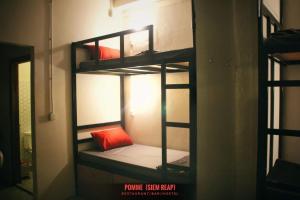 Katil atau katil-katil dalam bilik di Pomme Brewhouse Hostel