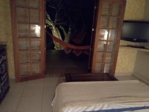 Recanto Pôr do Sol客房内的一张或多张床位