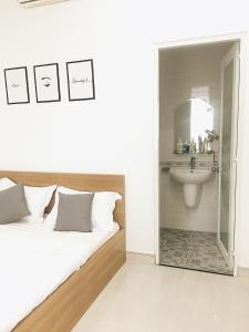 Ванная комната в Hello SaiGon Homestay
