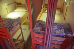 Postel nebo postele na pokoji v ubytování Salaam Namastey Backpackers