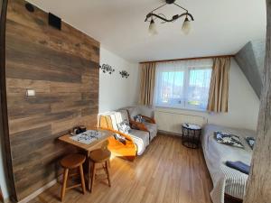 Posedenie v ubytovaní Pokoje i Apartamenty Regionalny Styl ul Króle 1a Zakopane