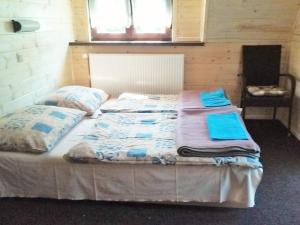 Postel nebo postele na pokoji v ubytování Chata Ivan