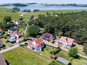 an aerial view of a house with a yard at Strandhaus Thiessow Whg_ 2 in Thiessow