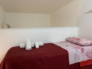 Letto o letti in una camera di DEA PARTHENOPE