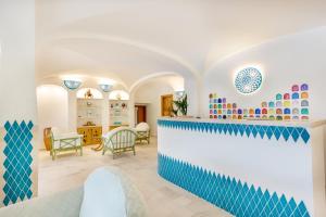 Posezení v ubytování Hotel Le Mimose