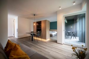 A bed or beds in a room at Sambucus Apartments -Premium Apartments for You and Your Dog