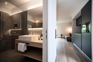 A bed or beds in a room at Sambucus Apartments -Premium Apartments for You and Your Dog