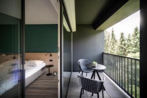 A bed or beds in a room at Sambucus Apartments -Premium Apartments for You and Your Dog