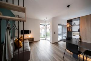 A television and/or entertainment centre at Sambucus Apartments -Premium Apartments for You and Your Dog