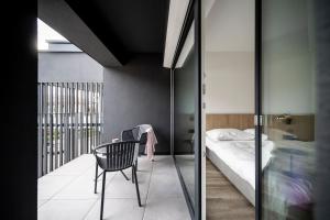 A bed or beds in a room at Sambucus Apartments -Premium Apartments for You and Your Dog