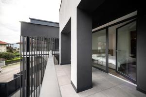A bed or beds in a room at Sambucus Apartments -Premium Apartments for You and Your Dog