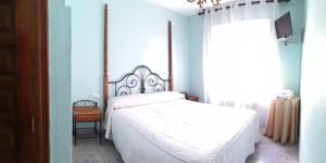 Cama o camas de una habitación en Hostal Restaurante Ceres