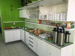 Кухня или мини-кухня в Pousada Ouriço
