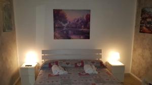 A bed or beds in a room at La Terrazza sul Centro