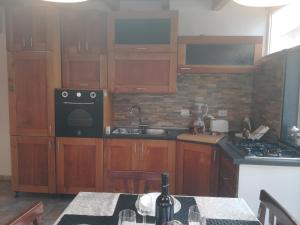 A kitchen or kitchenette at La Terrazza sul Centro