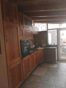 A kitchen or kitchenette at La Terrazza sul Centro