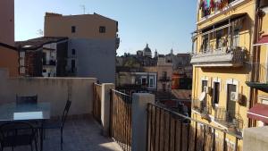 A balcony or terrace at La Terrazza sul Centro