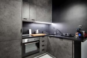 Kuchyňa alebo kuchynka v ubytovaní ALL SEASONS Luxury Suites1