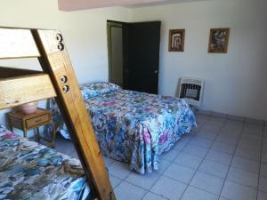 Postel nebo postele na pokoji v ubytování Villas La Quinta