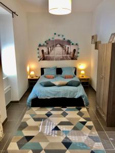 Ένα ή περισσότερα κρεβάτια σε δωμάτιο στο NOUVEAU : Le puits de Sarlat