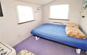ロンストラップにあるKlitperのベッドルーム1室(青いベッド1台付)