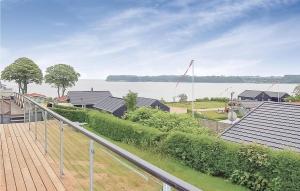 a view of the water from the roof of a house at Stunning Home In Hejls With 1 Bedrooms And Wifi in Hejls