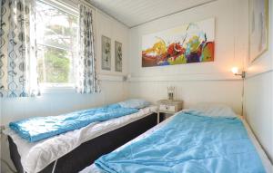 Postel nebo postele na pokoji v ubytování Holiday Home Uglevej Ebeltoft Iii + 25 fotografií