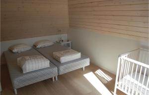 Кровать или кровати в номере Tidligere Gammelmark 26