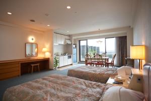 Voodi või voodid majutusasutuse Izumigo AMBIENT Izu-Kogen Condominium toas