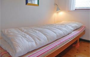 Postel nebo postele na pokoji v ubytování Holiday Home Tingodden Ix