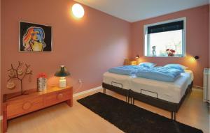 Ένα ή περισσότερα κρεβάτια σε δωμάτιο στο One-Bedroom Apartment In Ribe