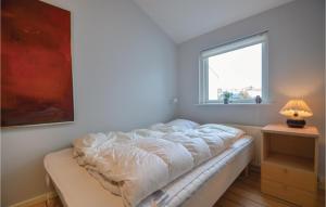 Postel nebo postele na pokoji v ubytování Apartment Nordre Strandvej Iii