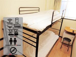 Postel nebo postele na pokoji v ubytování HOTEL LUCKY / Vacation STAY 4268