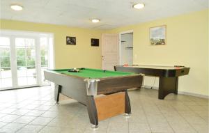 a billiard room with a pool table and a pool table at Gorgeous Home In Bramming With Sauna in Bramming