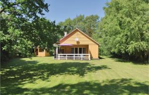 Zahrada ubytování Three-Bedroom Holiday Home In Humble