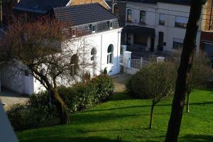 Jardin de l'établissement Gîte de la Conciergerie du Cheval Blanc