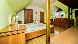 Postel nebo postele na pokoji v ubytování Apartmány Pod Čerťákem