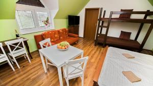 Postel nebo postele na pokoji v ubytování Apartmány Pod Čerťákem
